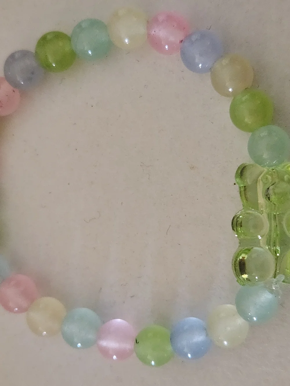 Hand Crafted Pastel Beaded Stretch Bracelet with Green Bear Charm